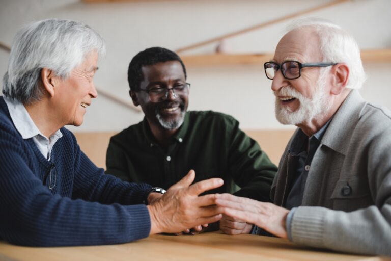 group of happy multiethnic senior friends spending time together